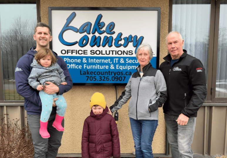 Adam Borutski, President of Lake Country Office Solutions, poses with daughter, Bryce Borutski; son, Jack Borutski; mother and CFO, Gail Borutski; and father and CEO, Peter Borutski. 